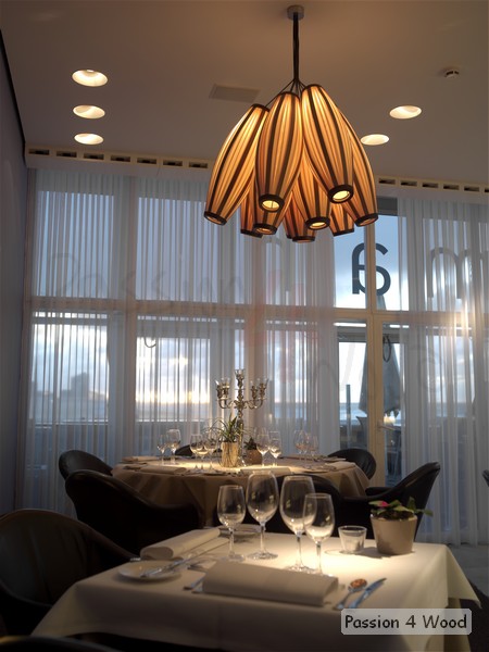 Pendal lighting in wood veneer in restaurant above bar and tables in - Agua del Mar 02